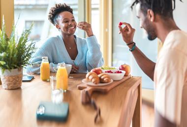 Couple eating breakfast